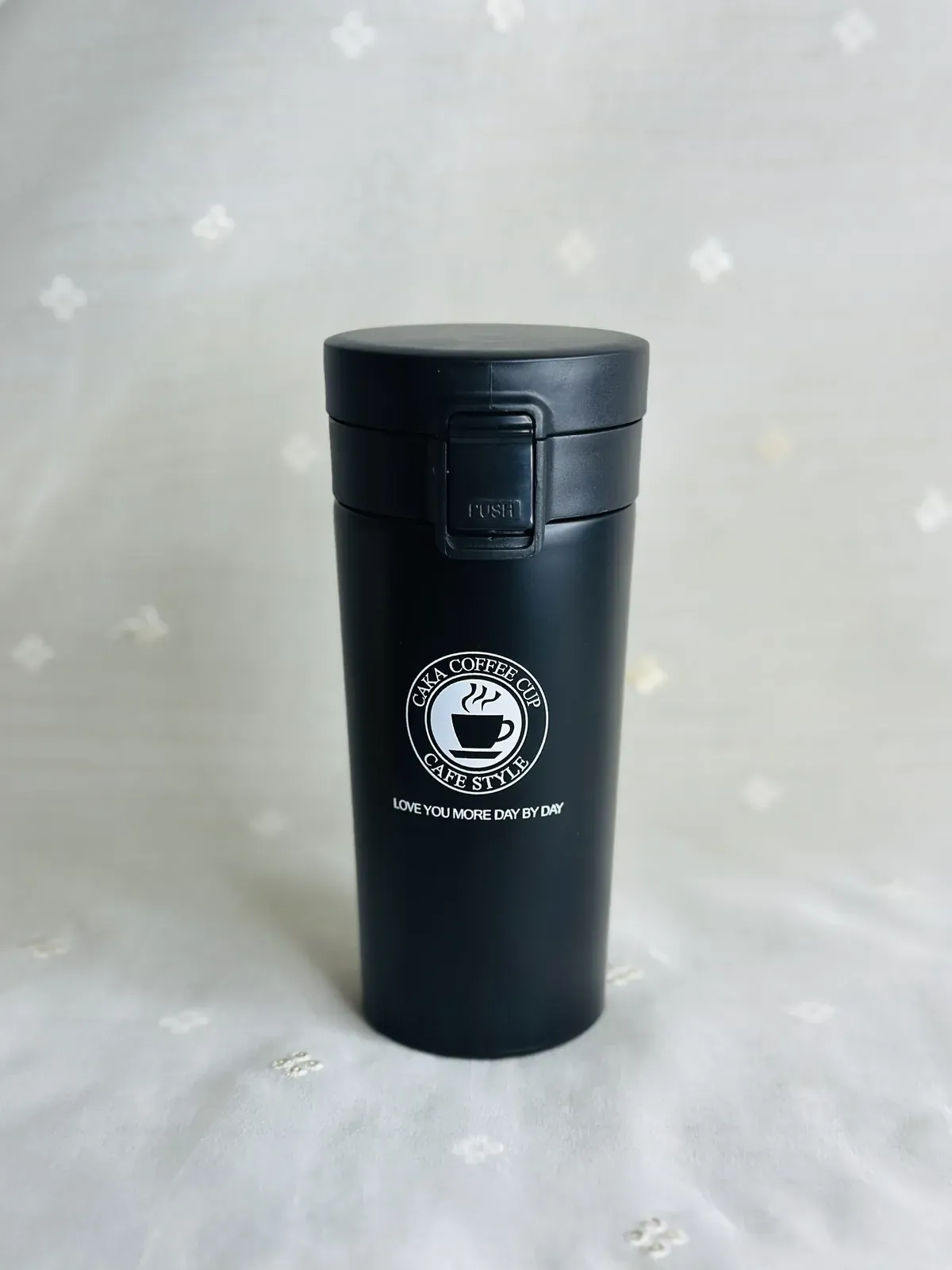 Insulated travel tumbler