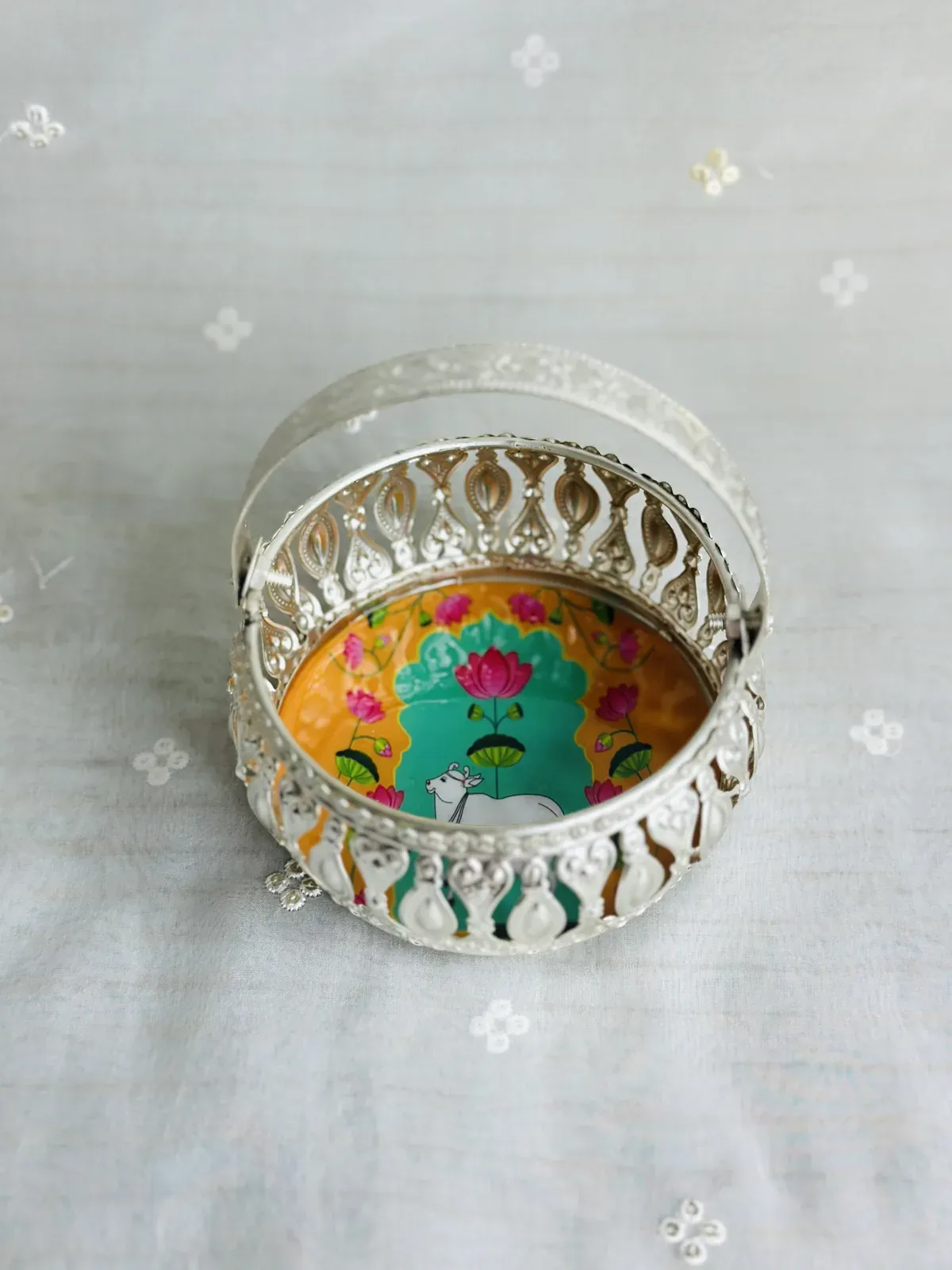Silver coated pichwai basket