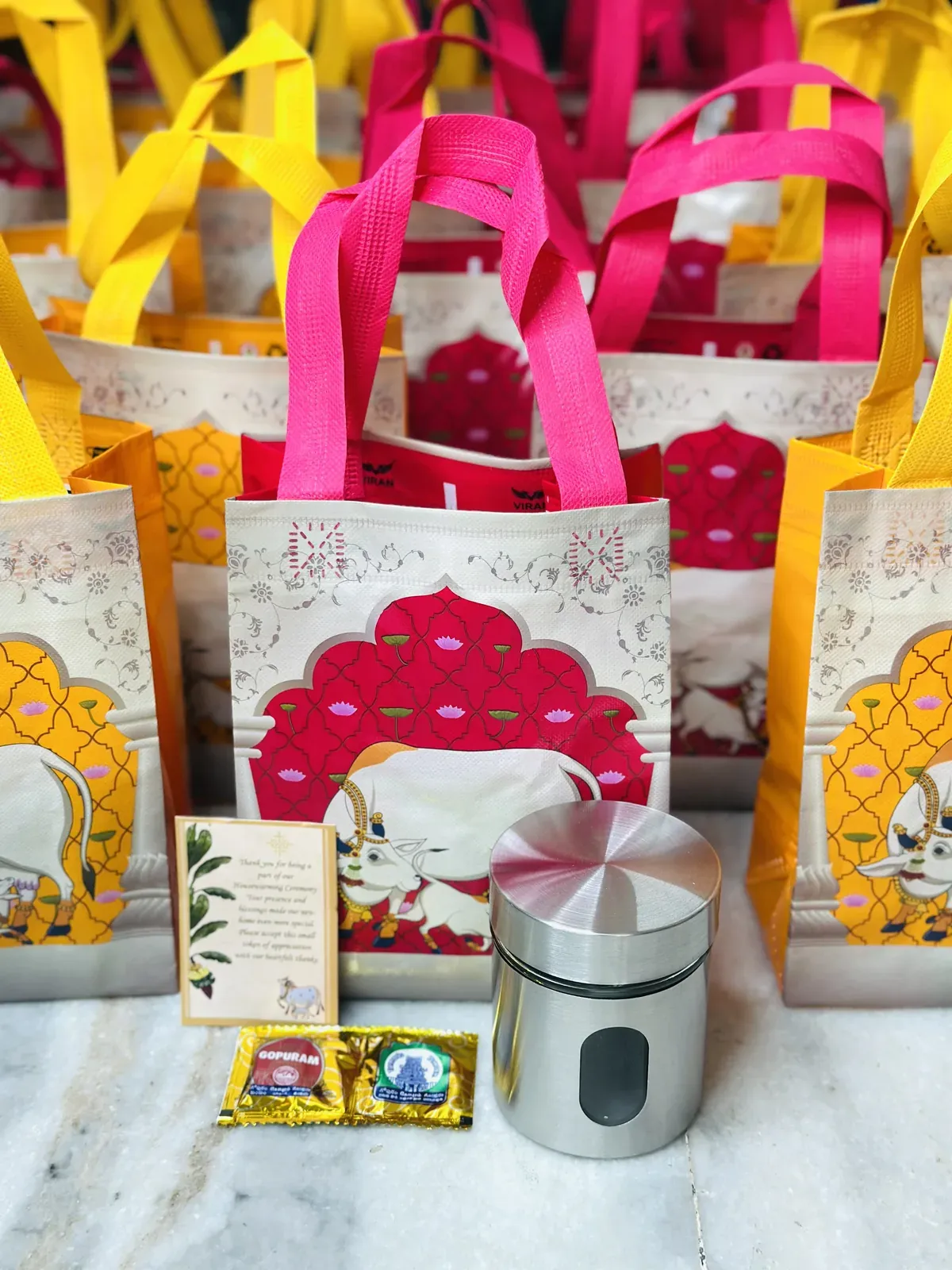 Glass canister with pichwai bag
