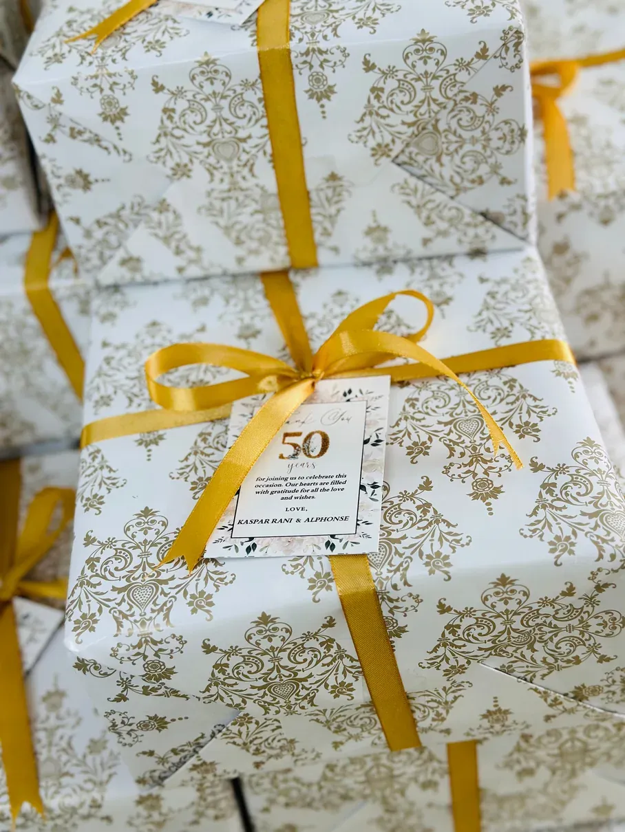 Gold-printed wrapping for a 50th anniversary celebration